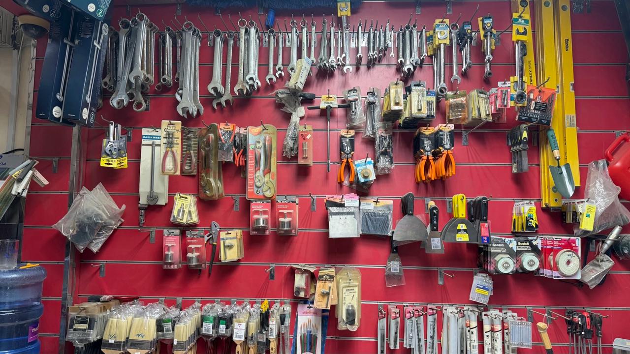 Spanners, drill bits, pliers and hand tools wall display